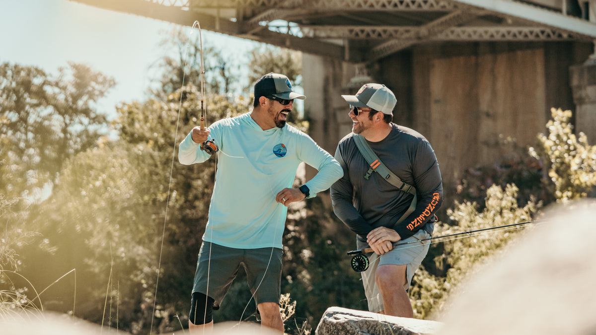 Two men fishing at the Llano River on a WaterTied guided fishing trip